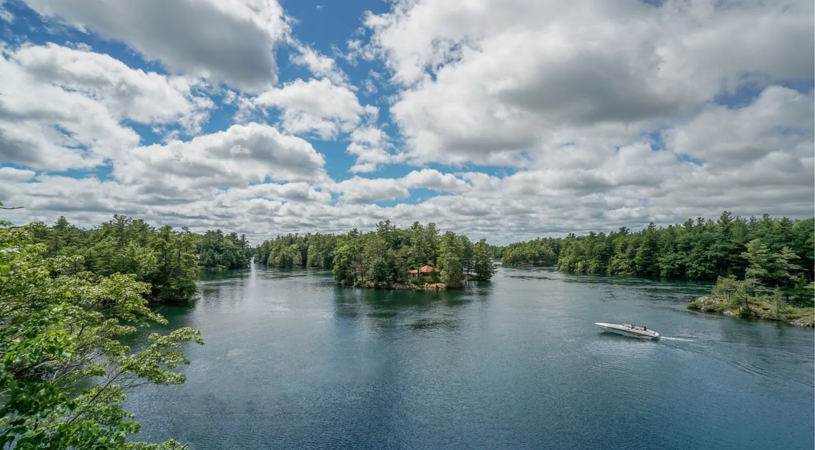 Aerial view of forested islands scattered across the St. Lawrence River